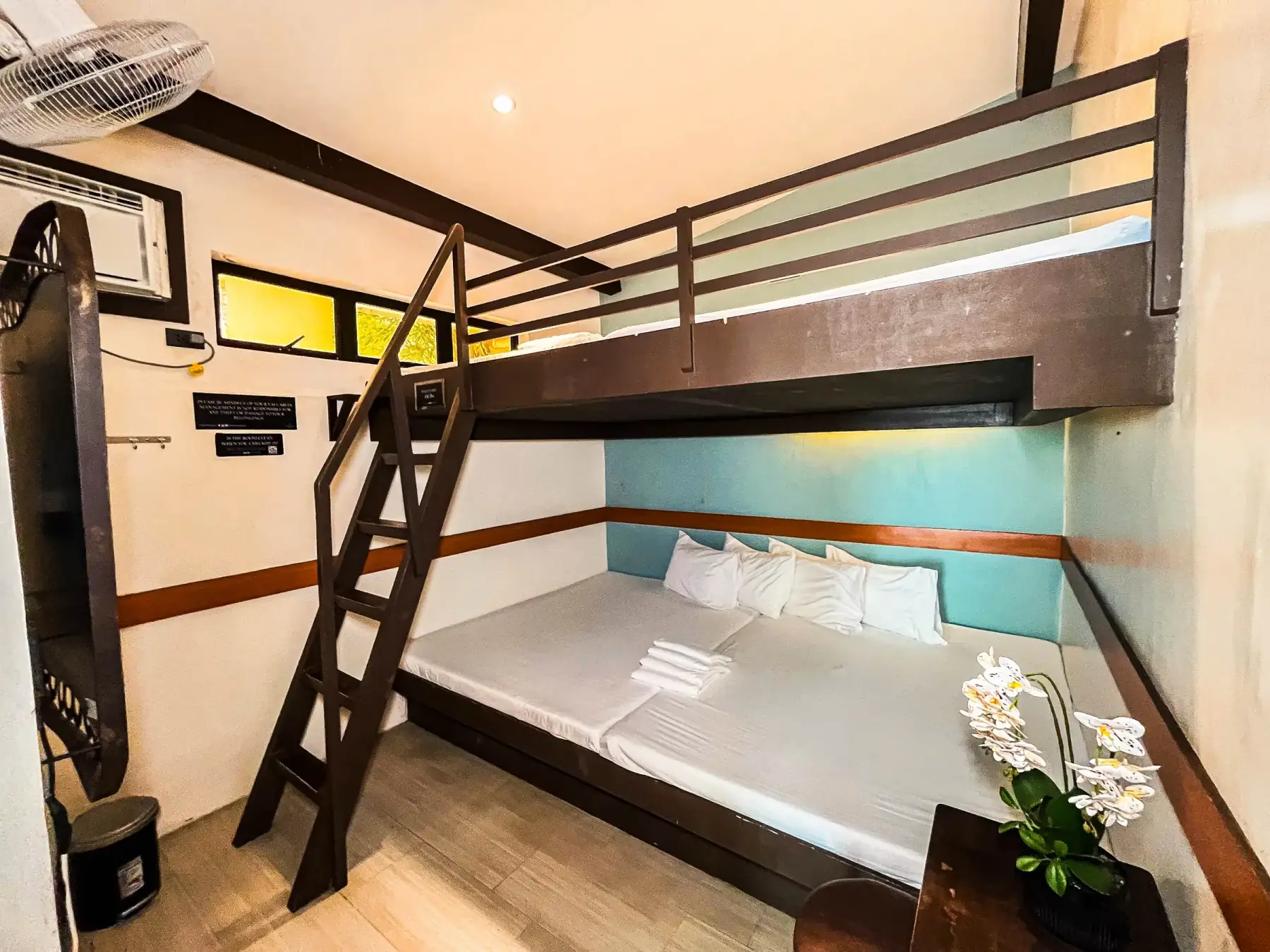 Casita — common room with four king beds under a decker loft