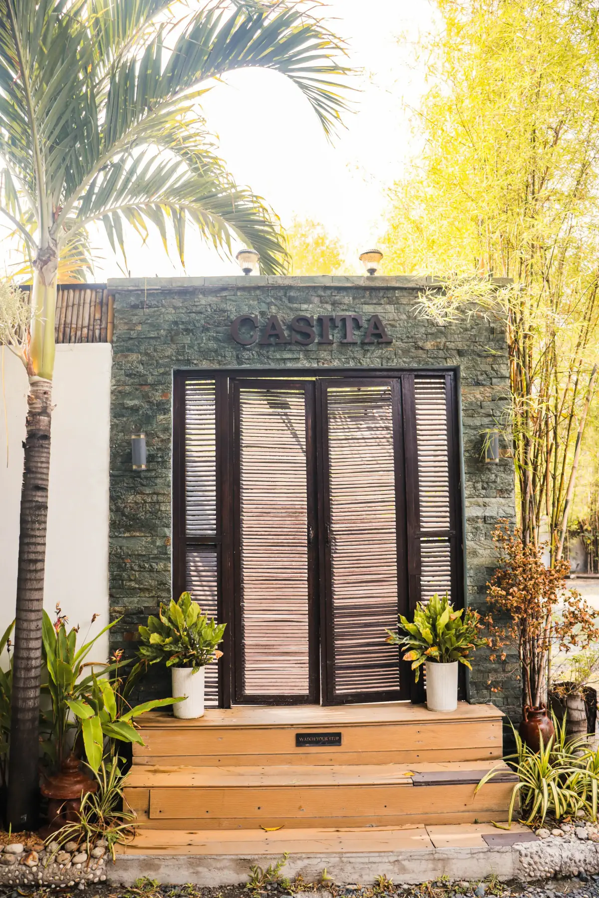 California Beach Pansol Casita — stone-clad facade and private entrance