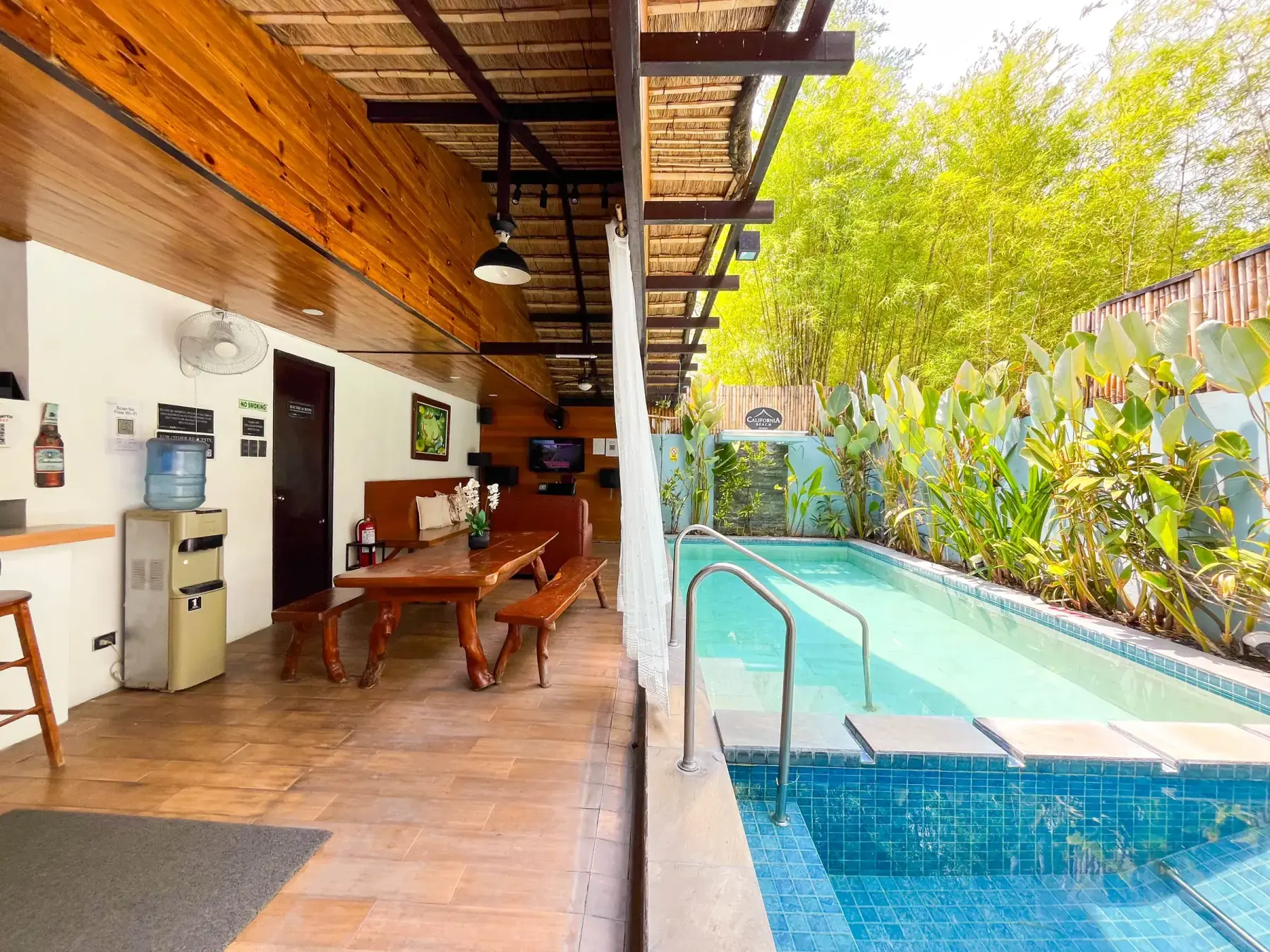 Casita — covered patio lounge beside the private pool