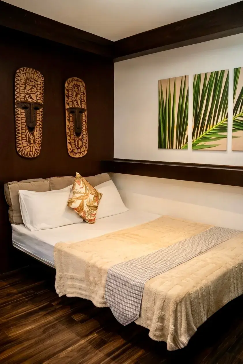 Villa 1 — master bedroom with a queen bed