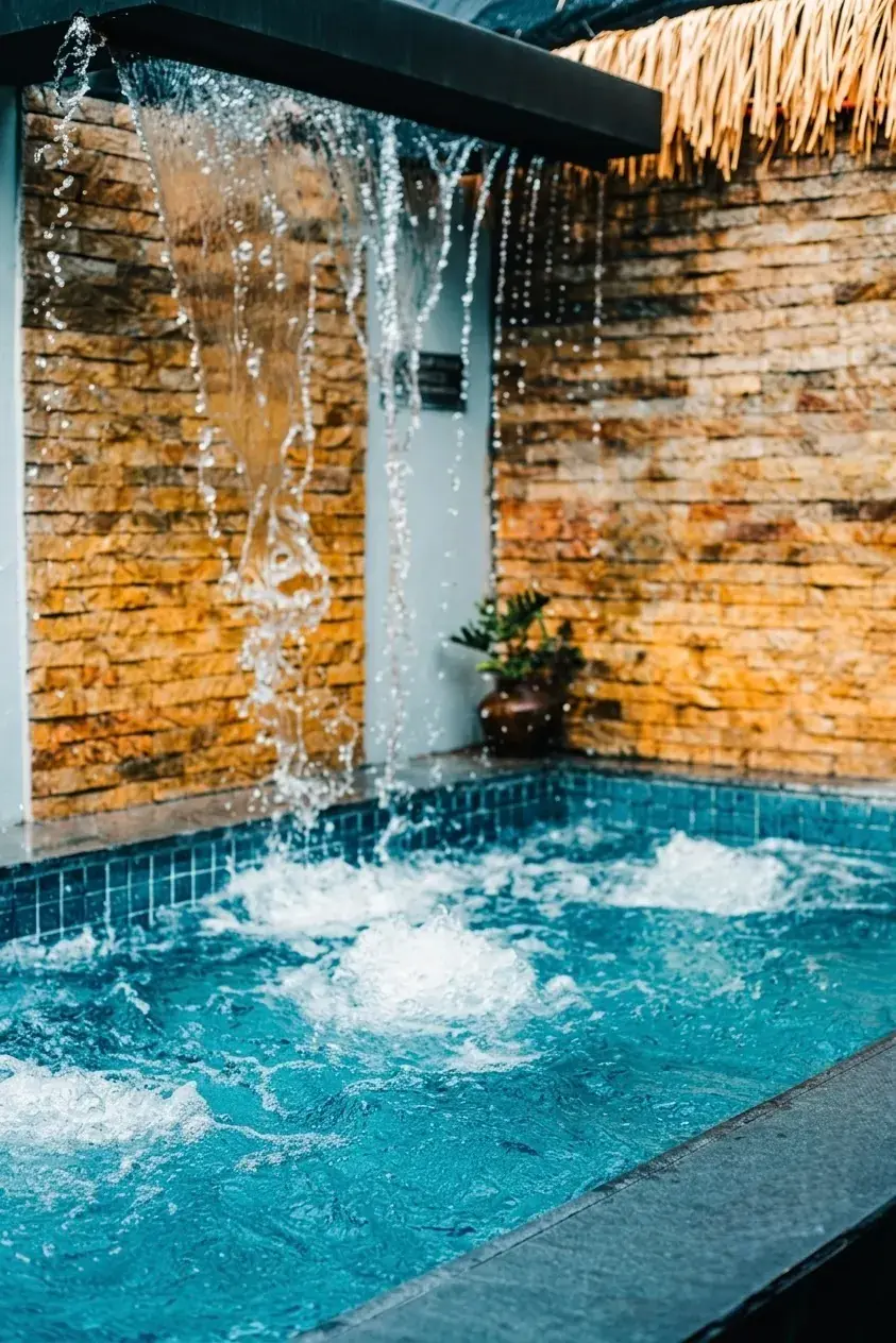 Villa 1 — private pool with a waterfall feature