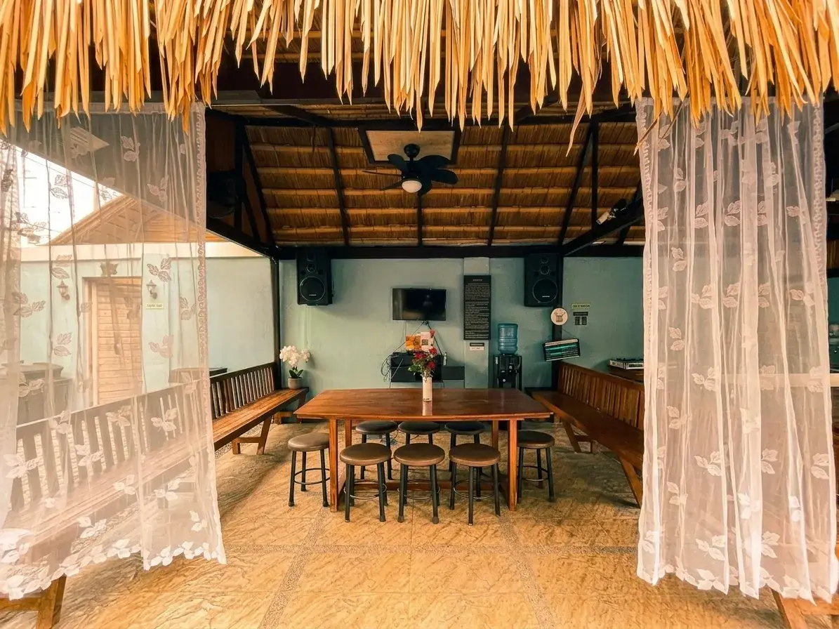 Villa 1 — covered videoke lounge by the pool
