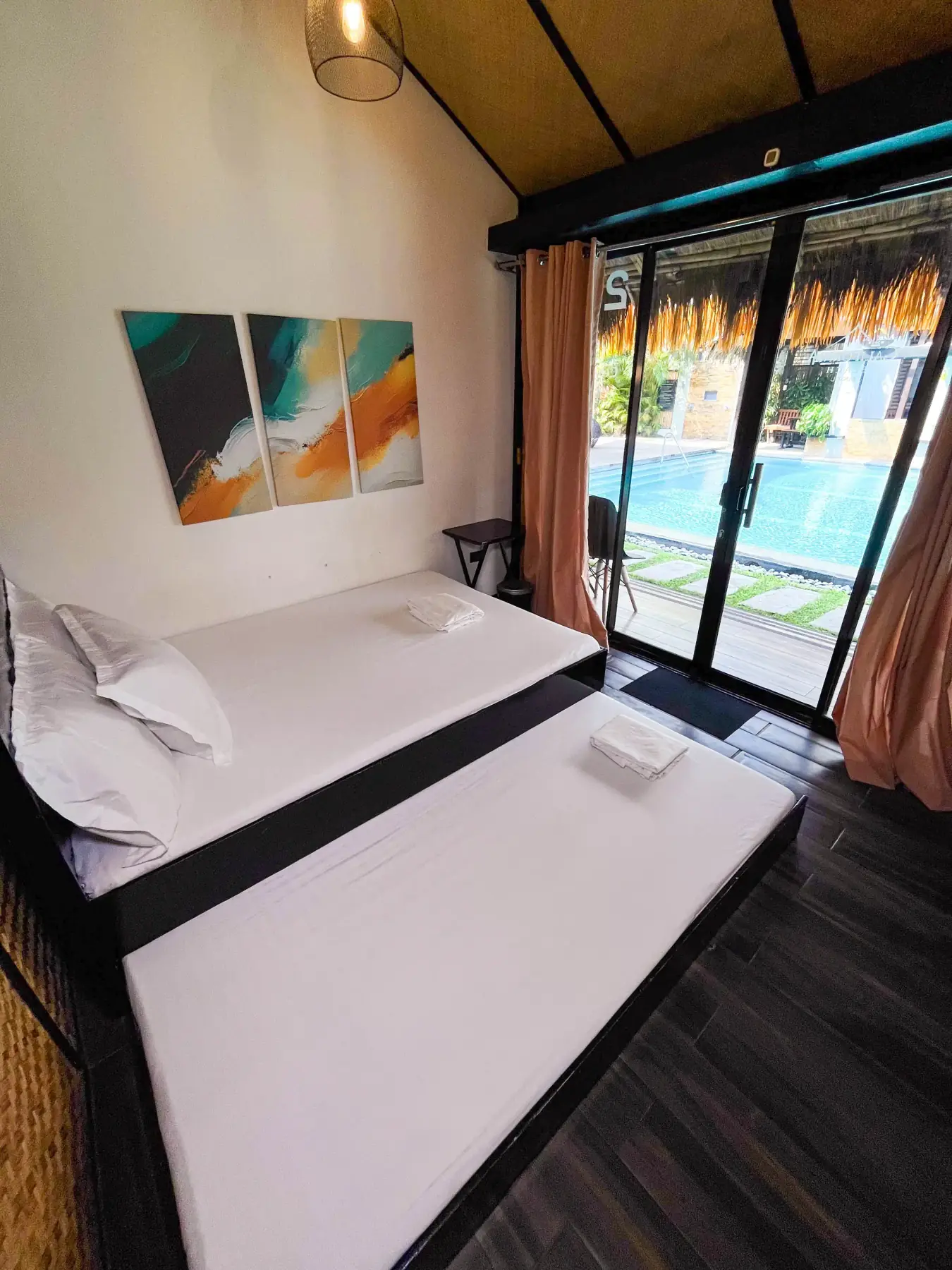 Villa 2 — Common Room 4 with a queen and pull-out bed