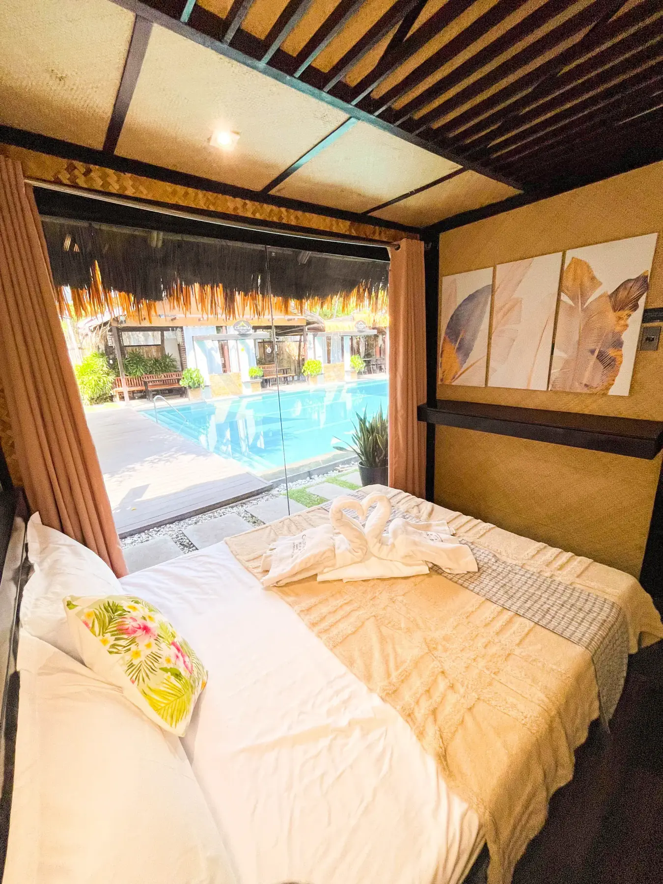 Villa 2 — Master Room 5 with a queen bed and pool view