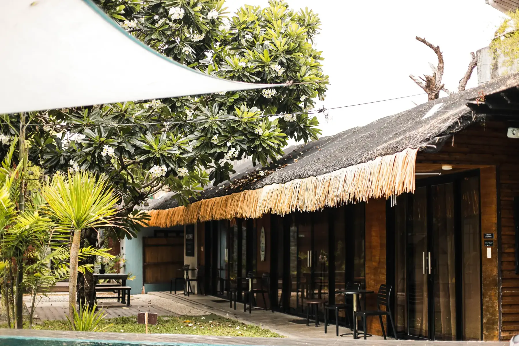 Villa 3 — poolside cabanas with bistro seating