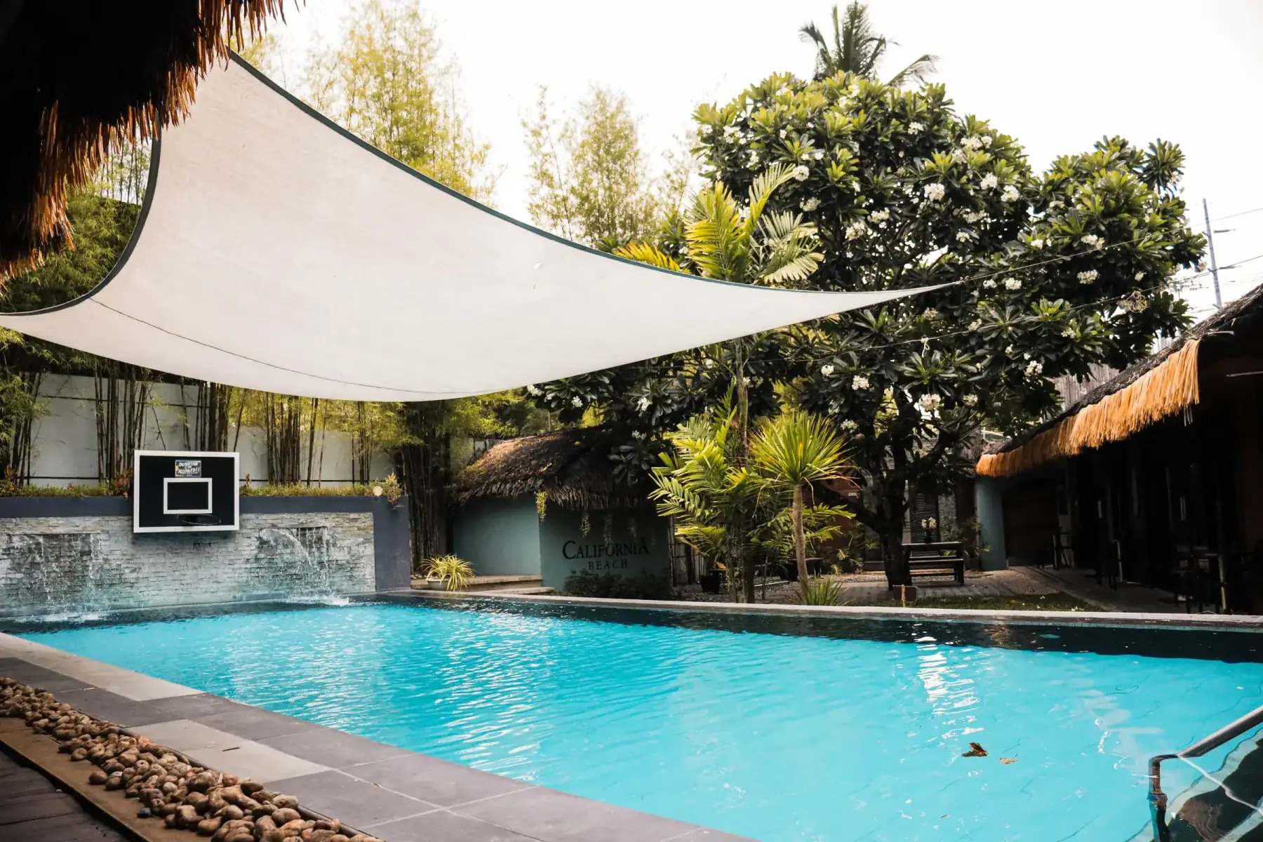 Villa 3 — covered poolside lounge walkway