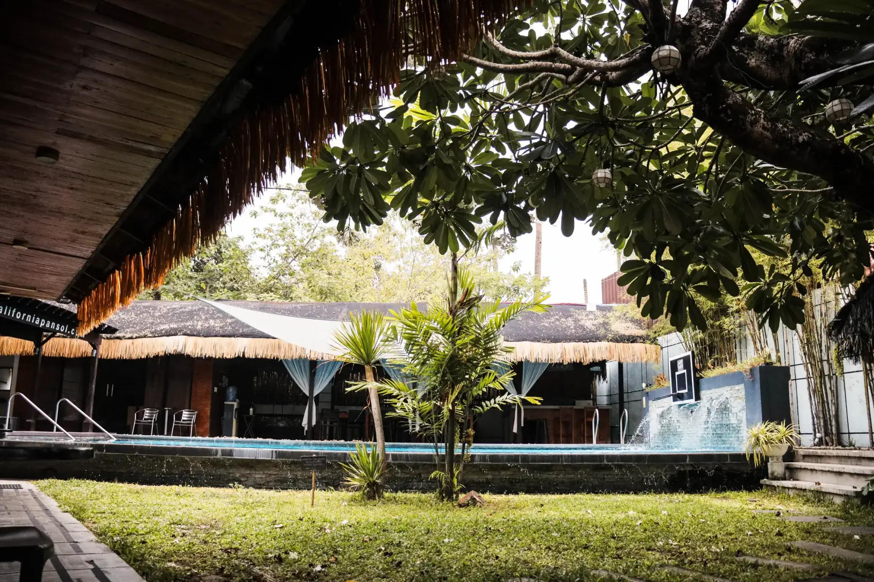 Villa 3 — private hot-spring pool across a garden courtyard